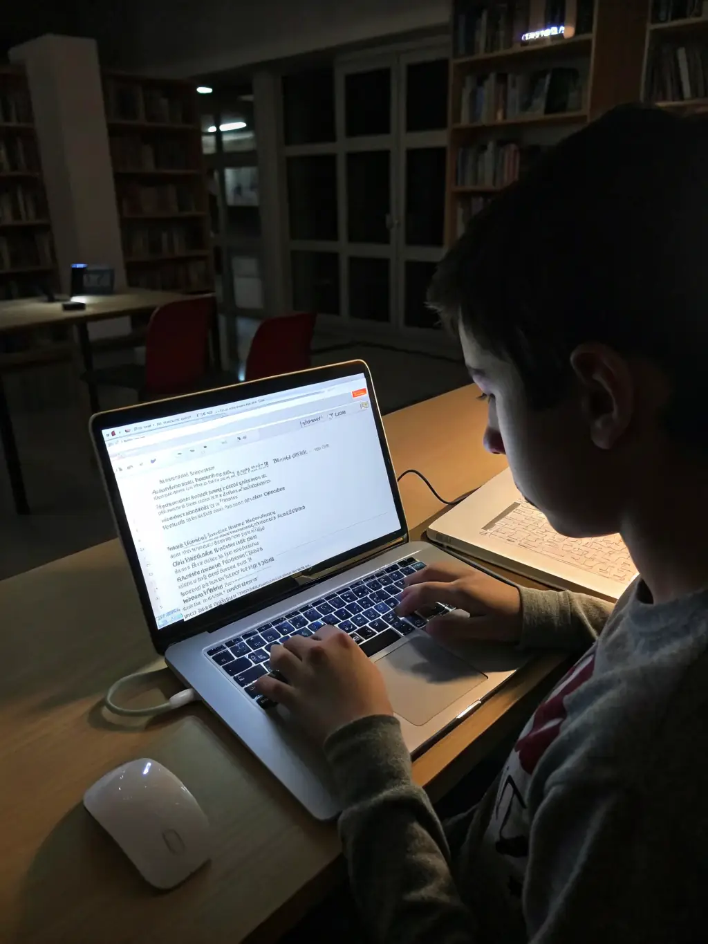 A student coding on a laptop with a modern web application interface on the screen, focusing on the practical aspects of full-stack development.